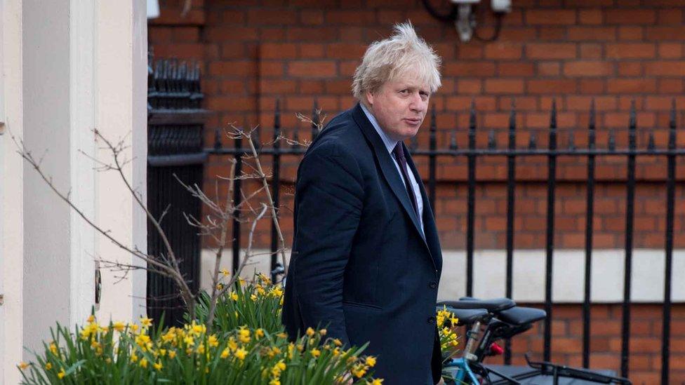 Boris Johnson leaves his house, 22 March