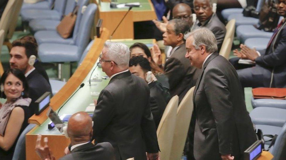 Secretary-General-designate, Antonio Guterres, (right) is escorted to the podium for a meeting of the UN General Assembly to confirm his appointment (13 October 2016)