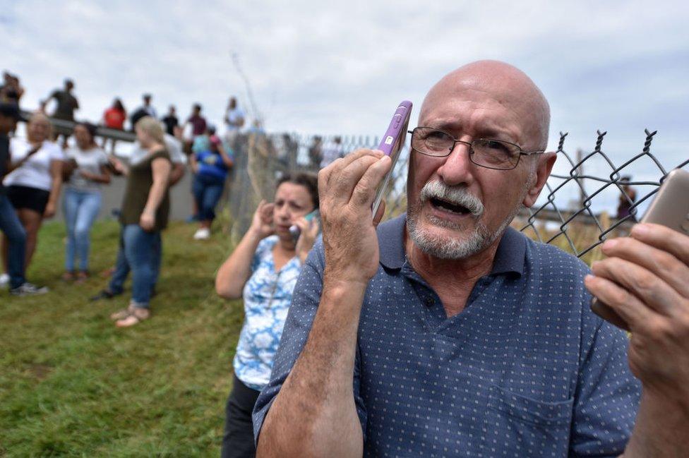 Residents have flocked to working mobile phone towers to call family members overseas