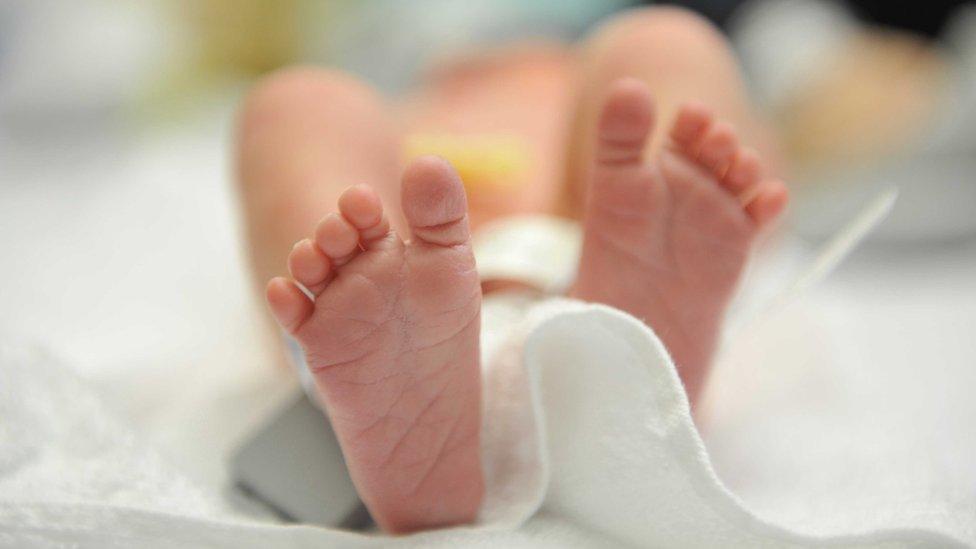 Feet of a newborn baby