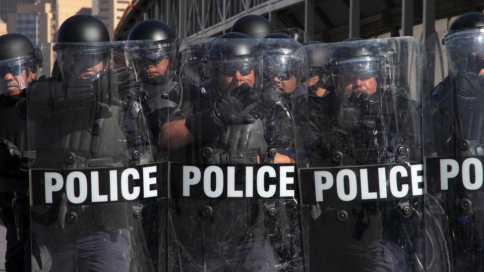 US riot police officers take part in a border security drill at the US-Mexico international bridge