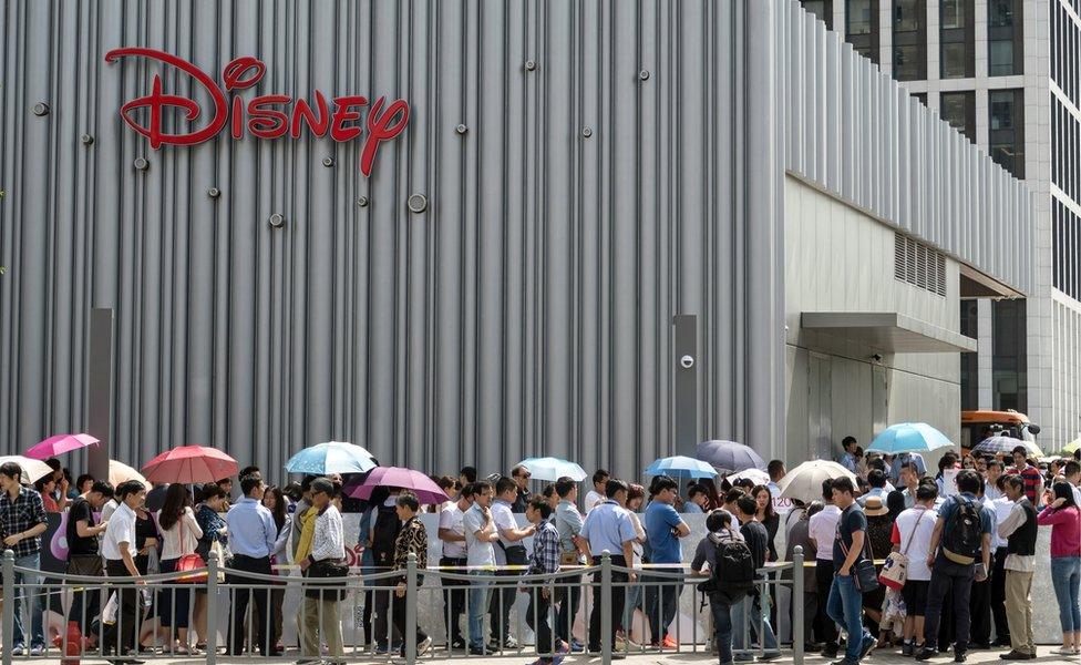 Long queue outside China's first official Disney store, in Shanghai, on 20 May 2015.