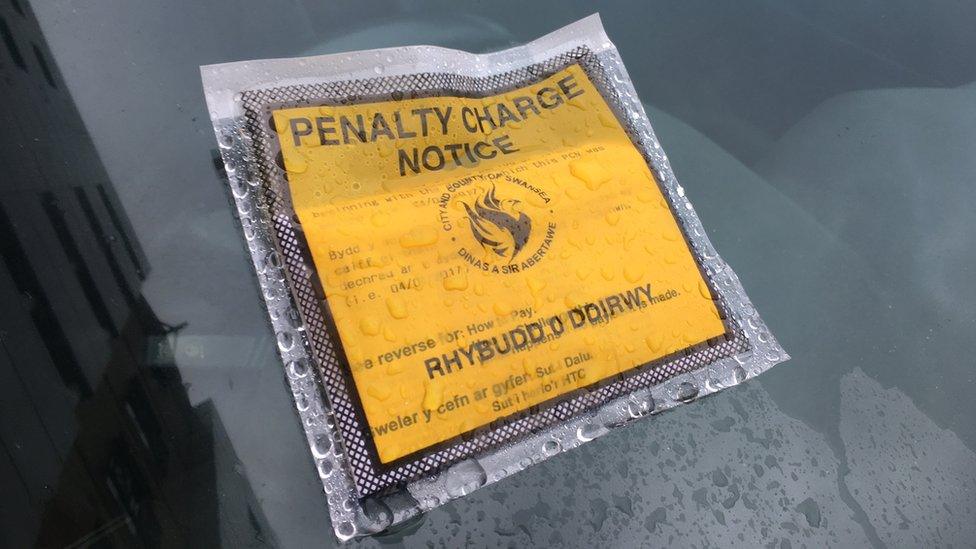 Parking ticket on a car parked on The Strand, Swansea - the most fined street in Wales in 2015/16