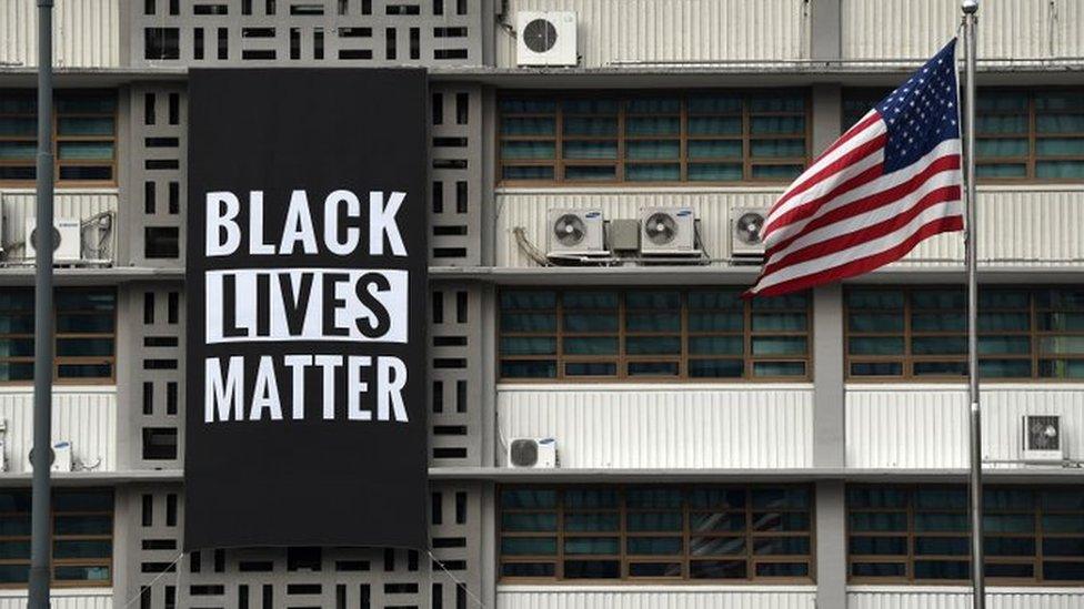 BLM banner on building