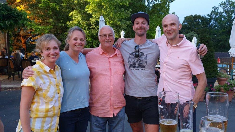 Tom Williams (centre) and his family