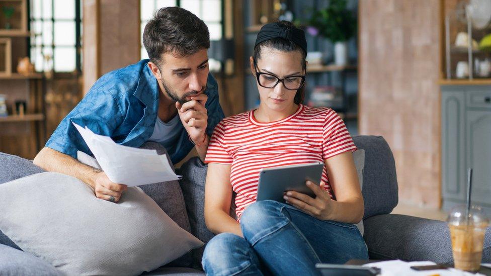 Couple looking at tablet