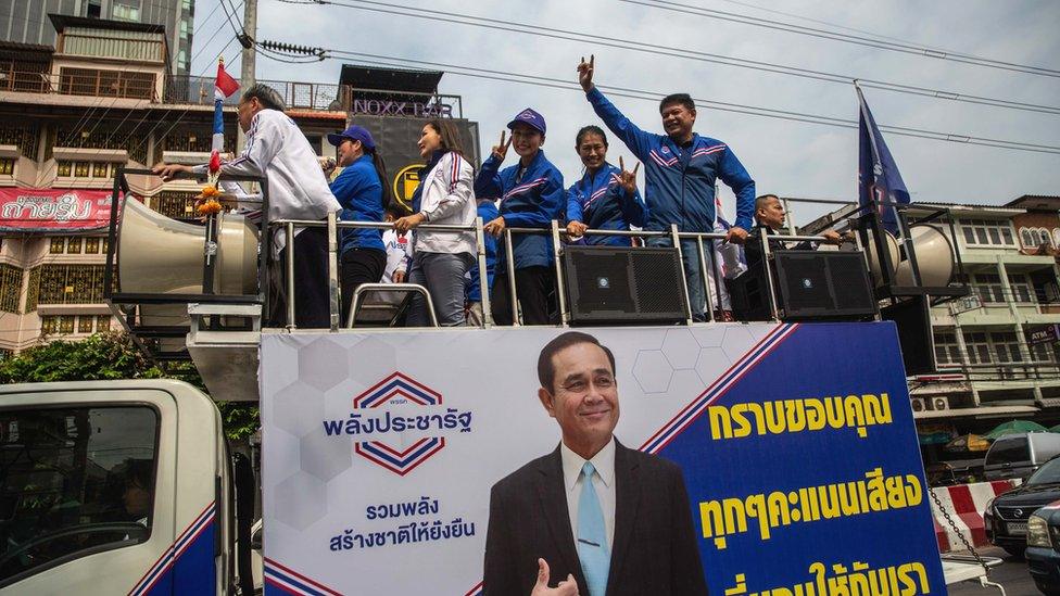 The Palang Pracha Rath Party leads a parade, featuring posters of Prime Minister General Prayuth Chan-o-cha