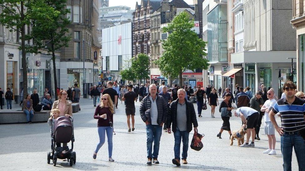 Shoppers in Liverpool