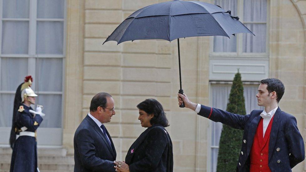 French President Francois Hollande greets the President of Mauritius, Ameenah Gurib-Fakim, as she arrives for a meeting at the Elysee Palace in Paris on 30 March 2016