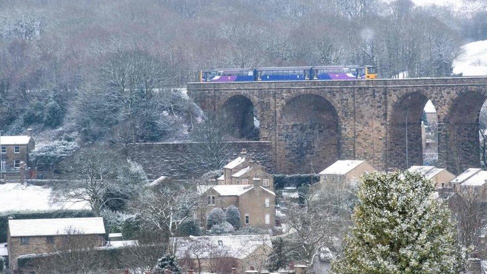 A train crosses the viaduct in Denby Dale, northern England