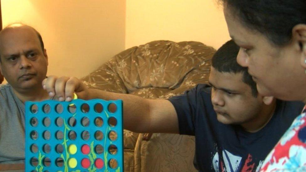 Anand family playing Connect 4