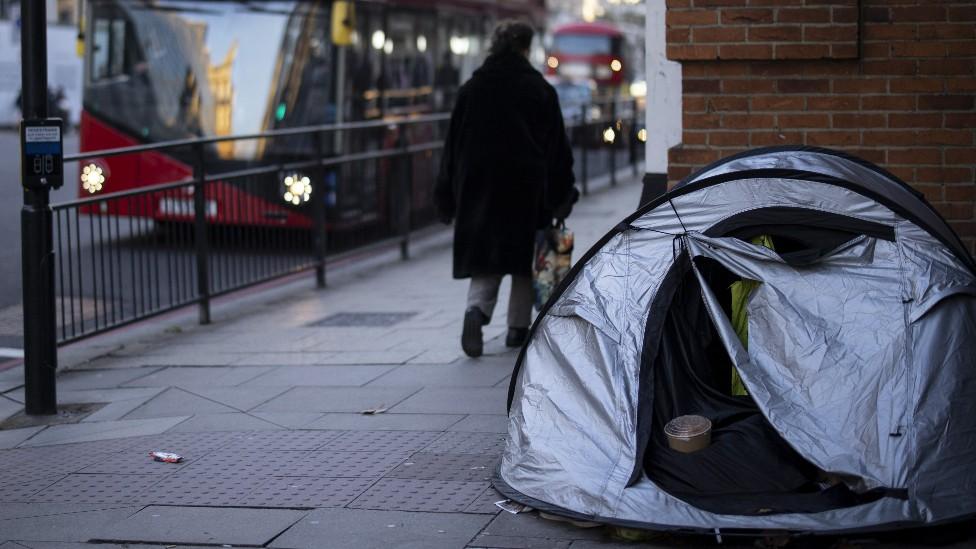 Tent on side of road in London