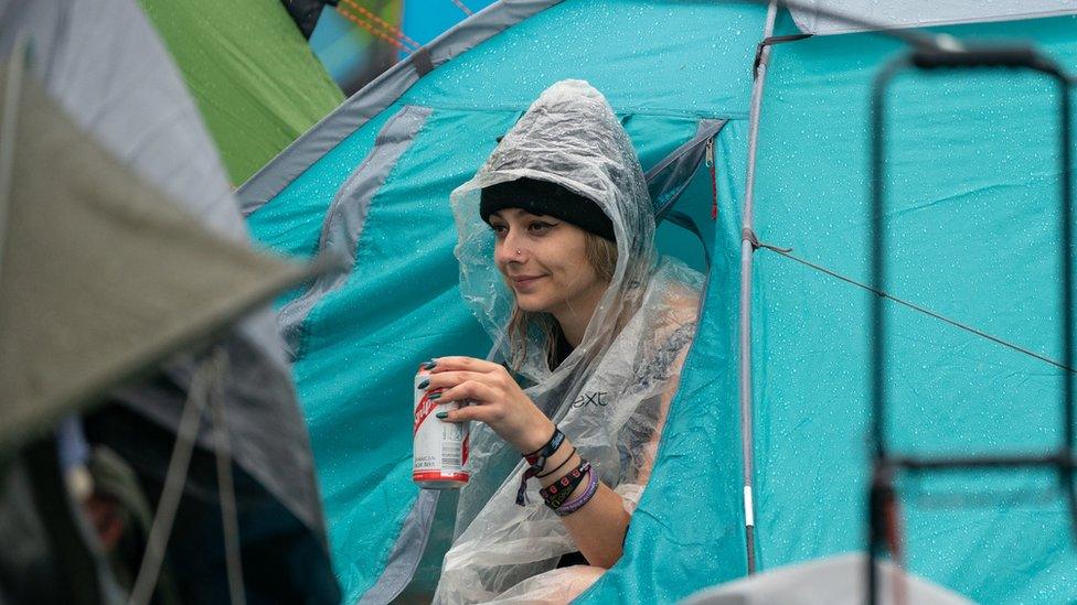 Woman in a tent at Download Festival 2021