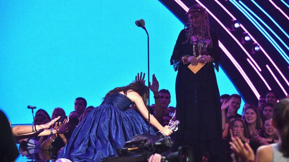 Camila bowing down to Madonna after accepting her award for video of the year