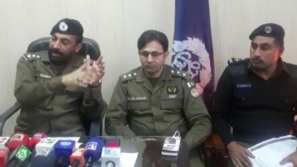 Pakistani police address the media