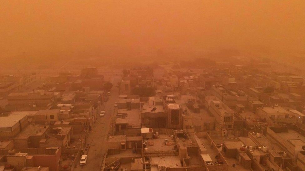 A aerial picture taken by drone shows the southern Iraqi city of Najaf during a dust storm