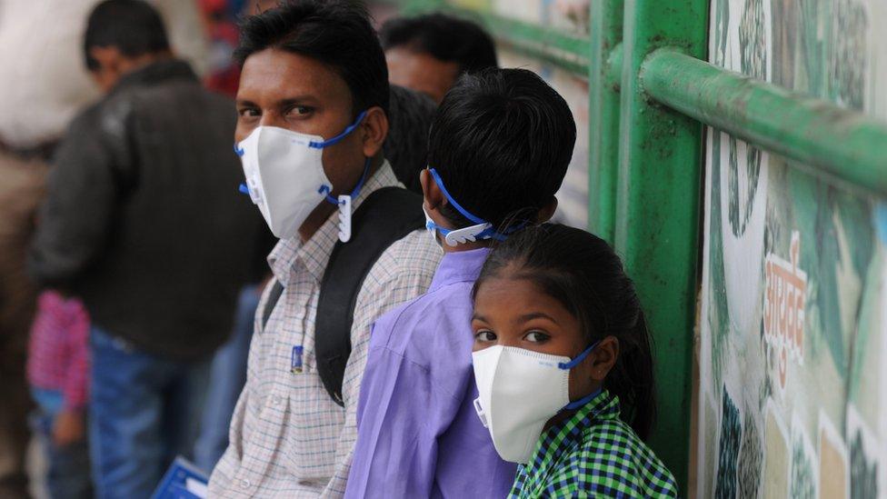 N95 masks to patients with respiratory, lung disease and other high-risk patients at the civil hospital, on November 13, 2017 in Gurgaon, India.