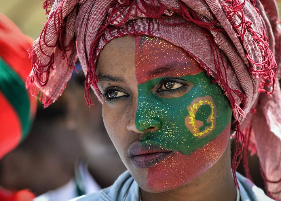 A woman takes part in celebrations for the return of the formerly banned anti-government group the Oromo Liberation Front (OLF) at Mesquel Square in Addis Ababa, Ethiopia - 15 September 2018