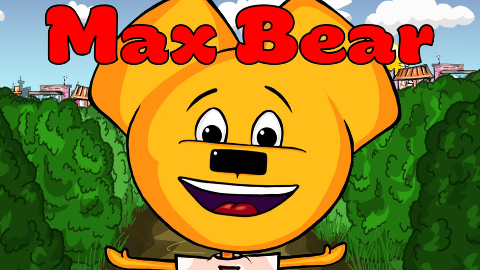 The re-versioned Max Bear smiling with the words 'Max Bear' on top of his head