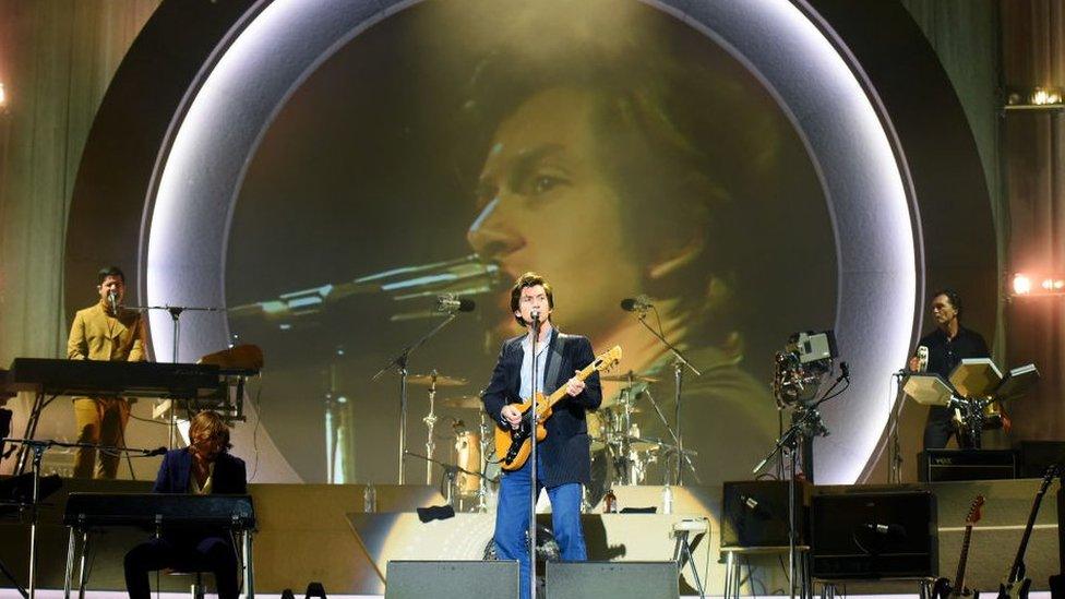 Alex Turner (C) of the Arctic Monkeys performs on Main Stage East on Day 3 of Leeds Festival on August 28, 2022 in Leeds, England.