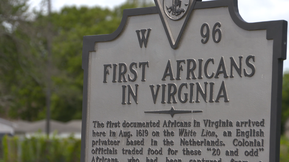 A plaque memorialising the arrival of the first US slaves