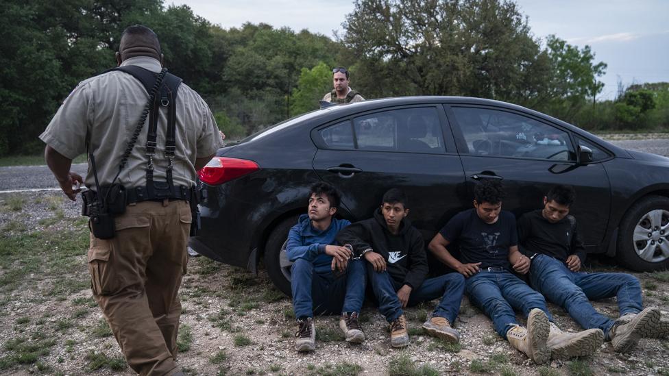 A Texas sheriff arresting suspected migrants in March 2023