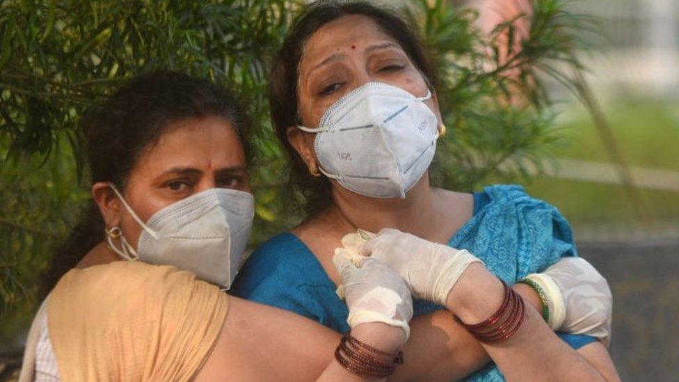 Relatives of a Covid-19 victim mourn outside Batra hospital, in Tughlakabad, on May 1, 2021 in New Delhi, India.