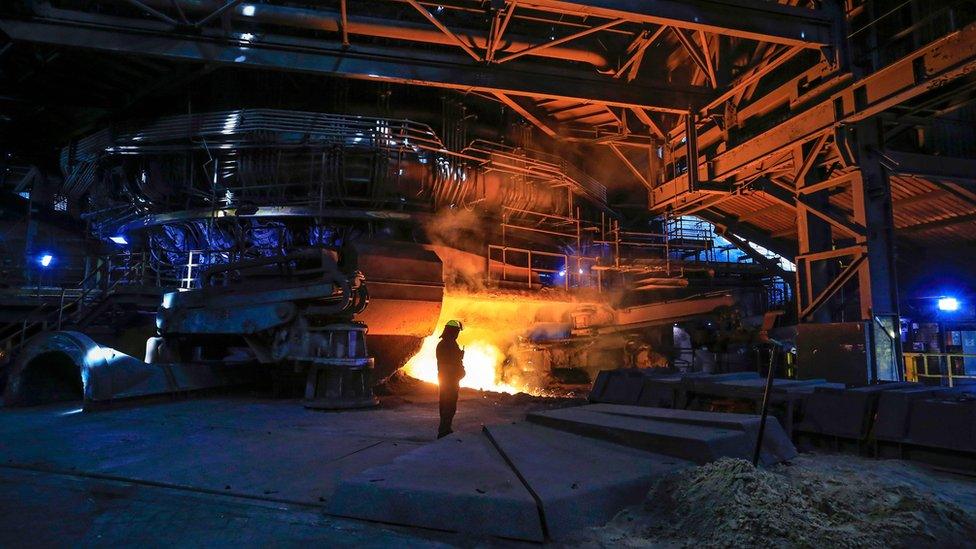 British Steel interior with worker in foreground