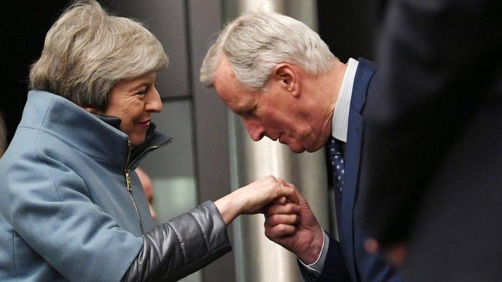 Theresa May and Michel Barnier