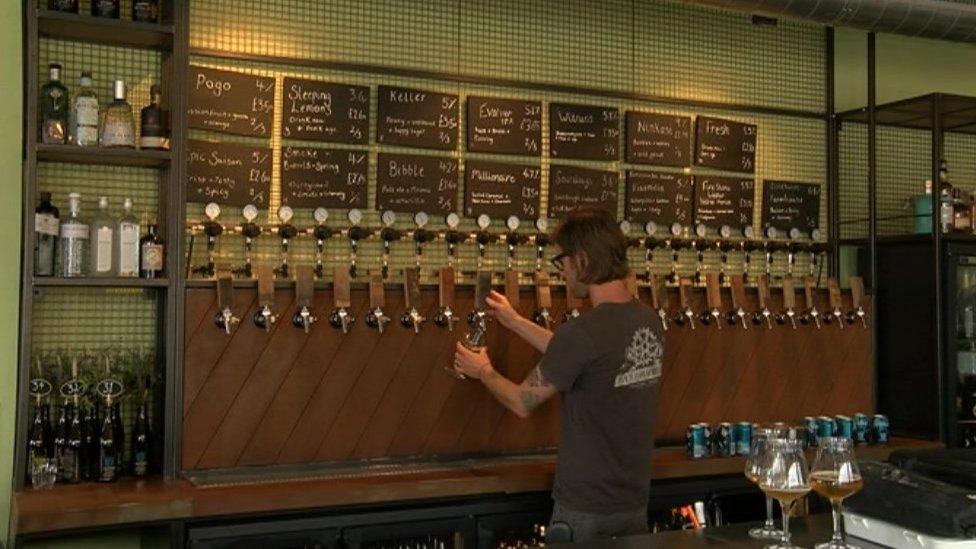 Pouring craft beer at Wild Beer at Wapping Wharf