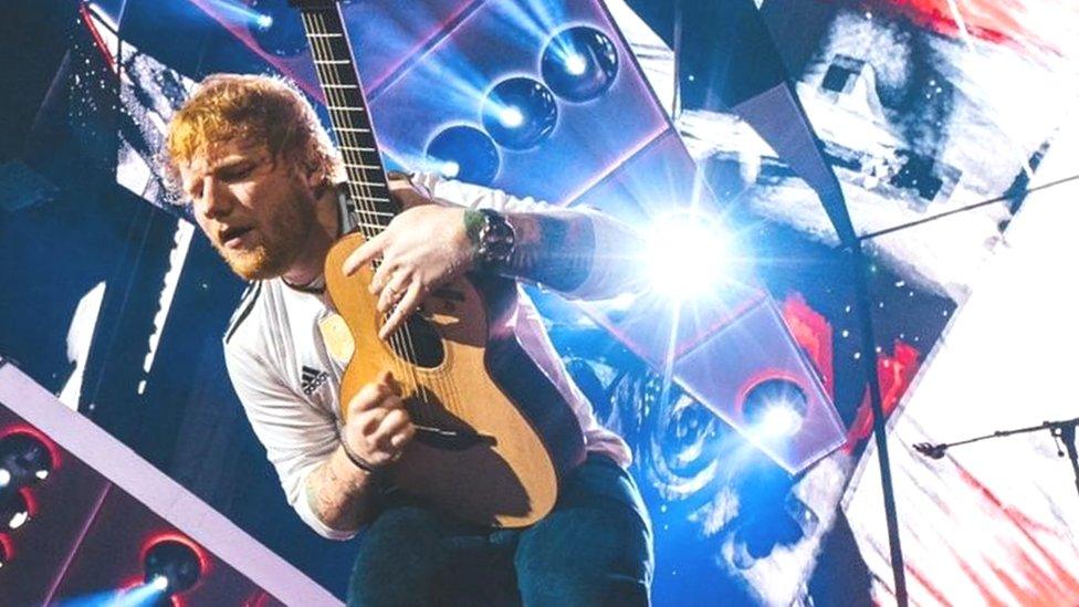 Ed Sheeran with a one-of-a-kind prototype Equals guitar