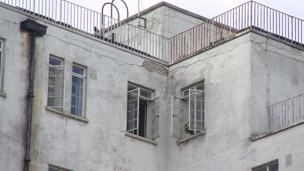 Grubby exterior of Epsom and St Helier Hospital