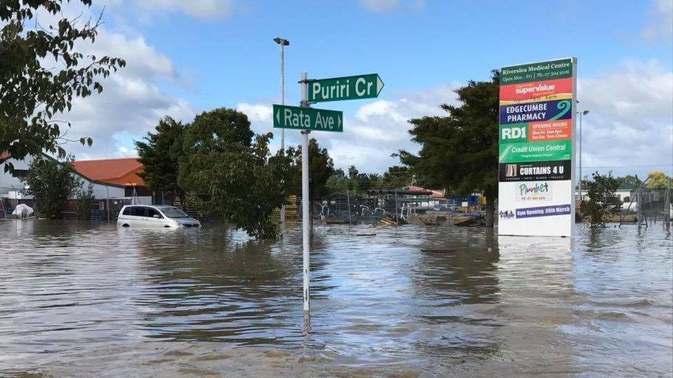 Flood waters halfway up a lamppost in Edgecumbe