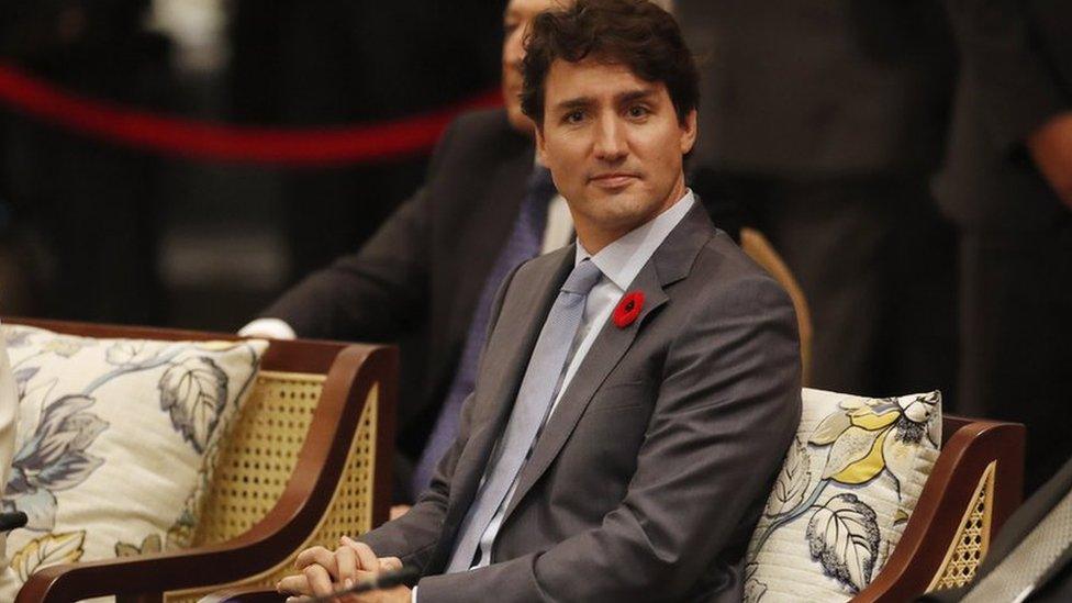 Canada's Prime Minister Justin Trudeau and Brunei's Sultan Hassanal Bolkiah attend the Asia-Pacific Economic Cooperation summit