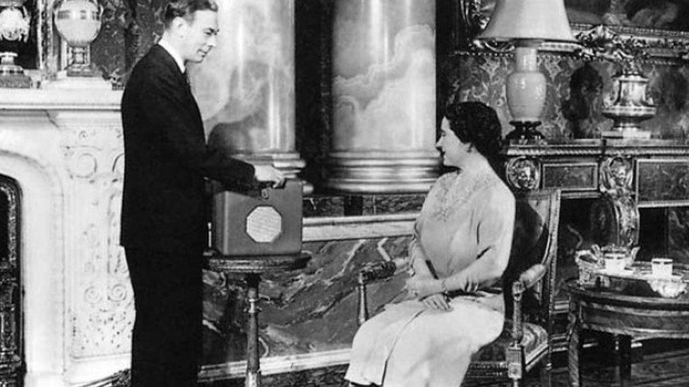 The late Queen Mother and King George VI are seen with the same or similar Roberts radio in 1948