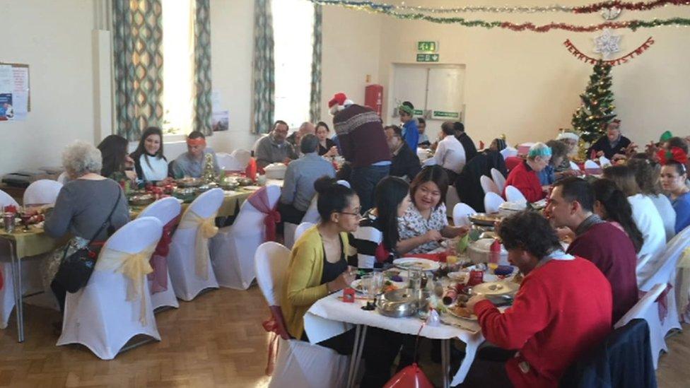 People enjoying Christmas dinner hosted by Mo Fayose