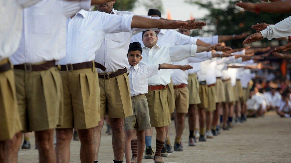 Indian volunteers of Hindu nationalist Rashtriya Swayamsevak Sangh (RSS) party gather during a visit by their chief, Mohan Bhagwat, in Jammu on September 29, 2013.