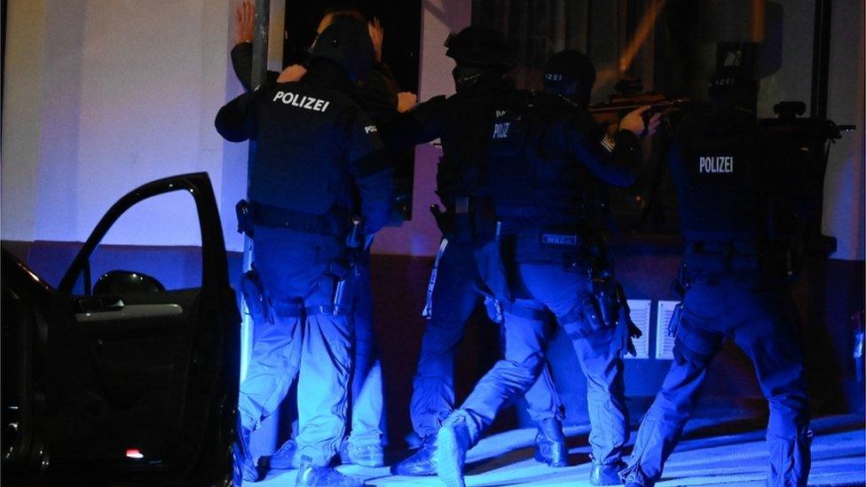 Austrian police men search a civilian patrol after a shooting near the "Stadttempel" synagogue in Vienna, Austria, 02 November 2020