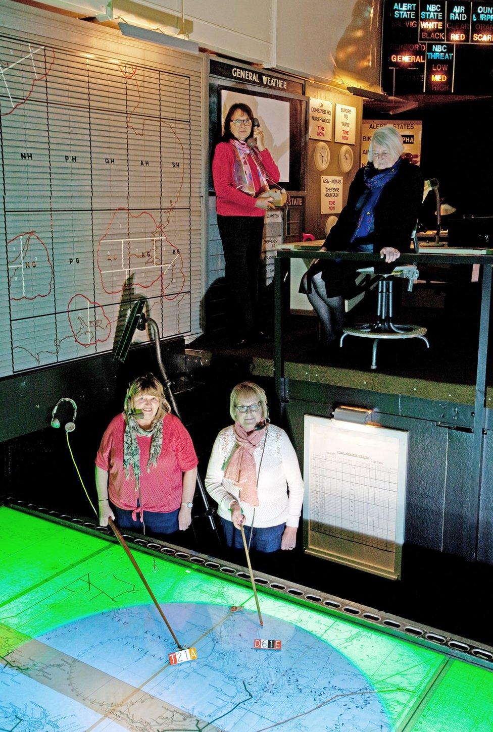 Janet Huitt, Eileen Mann, Janet Levesley, Barbara Turner in the radar operations room at Holmpton Cold War bunker