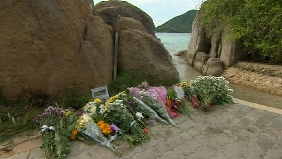 Floral tributes on beach at Koh Tao