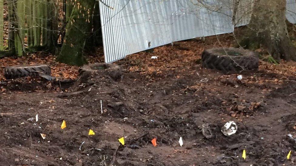 Police markers in Inverkip garden where they are searching