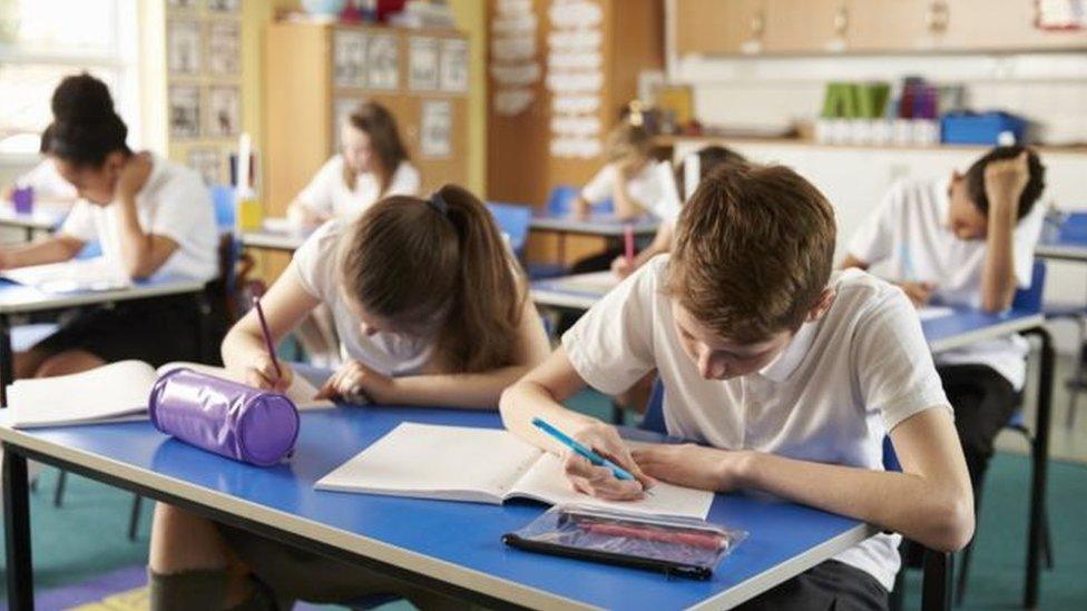 School children at tables