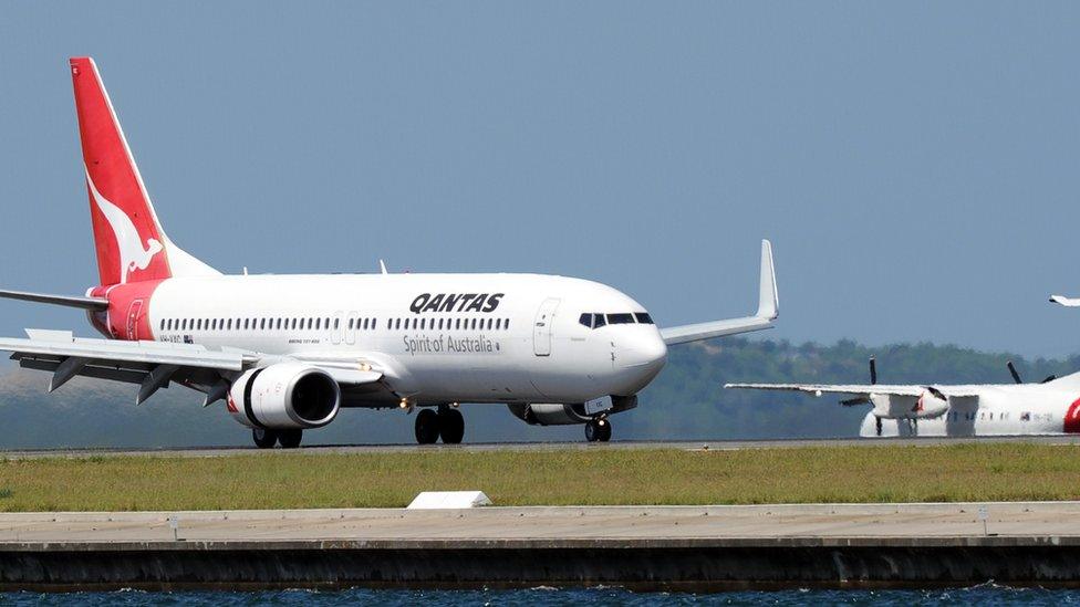 A Qantas Boeing 737 plane prepares for take off at Sydney Airport