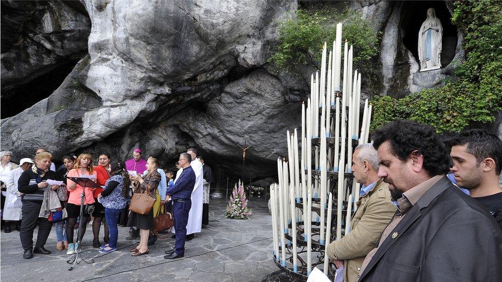 Prayers said at the Massabielle grotto in Lourdes