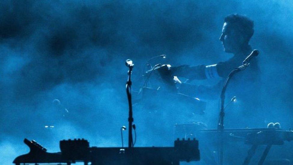 Robert Del Naja performing with Massive attack