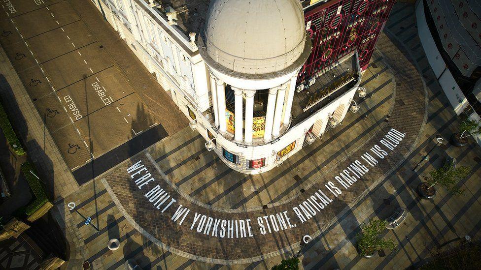 Poetry written on the pavement outside The Alhambra Theatre in Bradford