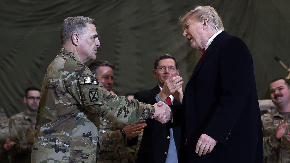 President Trump shaking hands with Joint Chiefs Chairman General Mark Milley at Bagram Air Field in Afghanistan on Thanksgiving