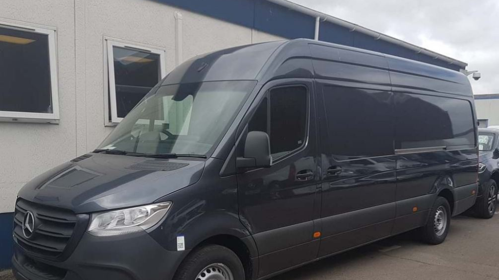 The Mercedes Sprinter van parked on a driveway