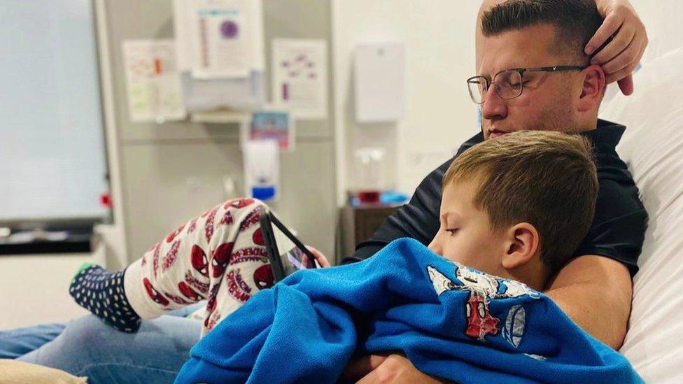 David Watson in hospital with his late son Adam