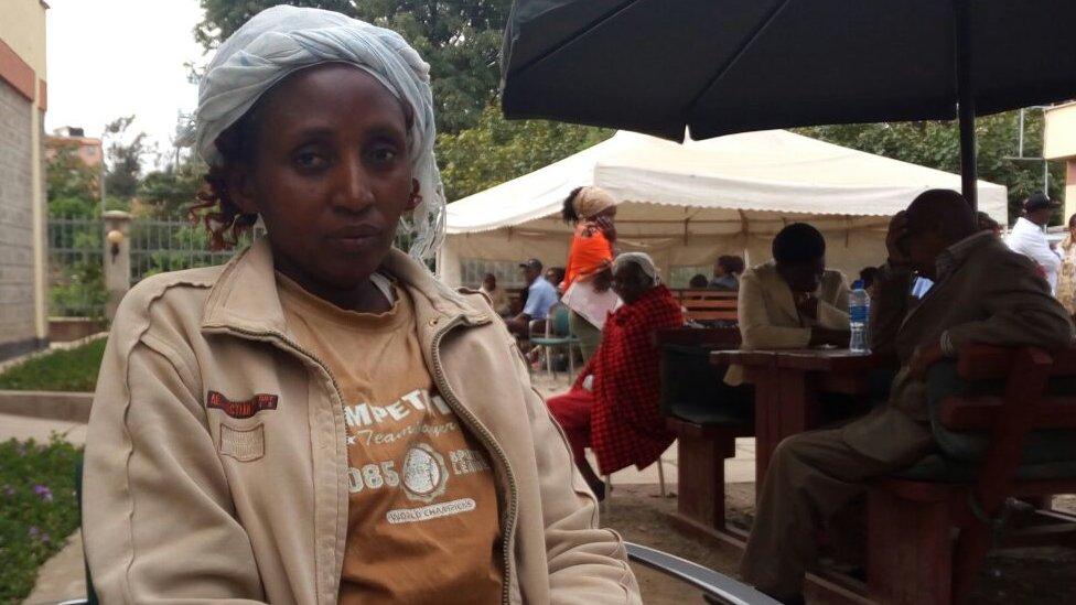 Female cancer patient seated